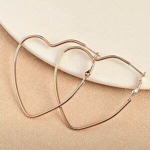 NIP gold-tone heart shaped hoop earrings